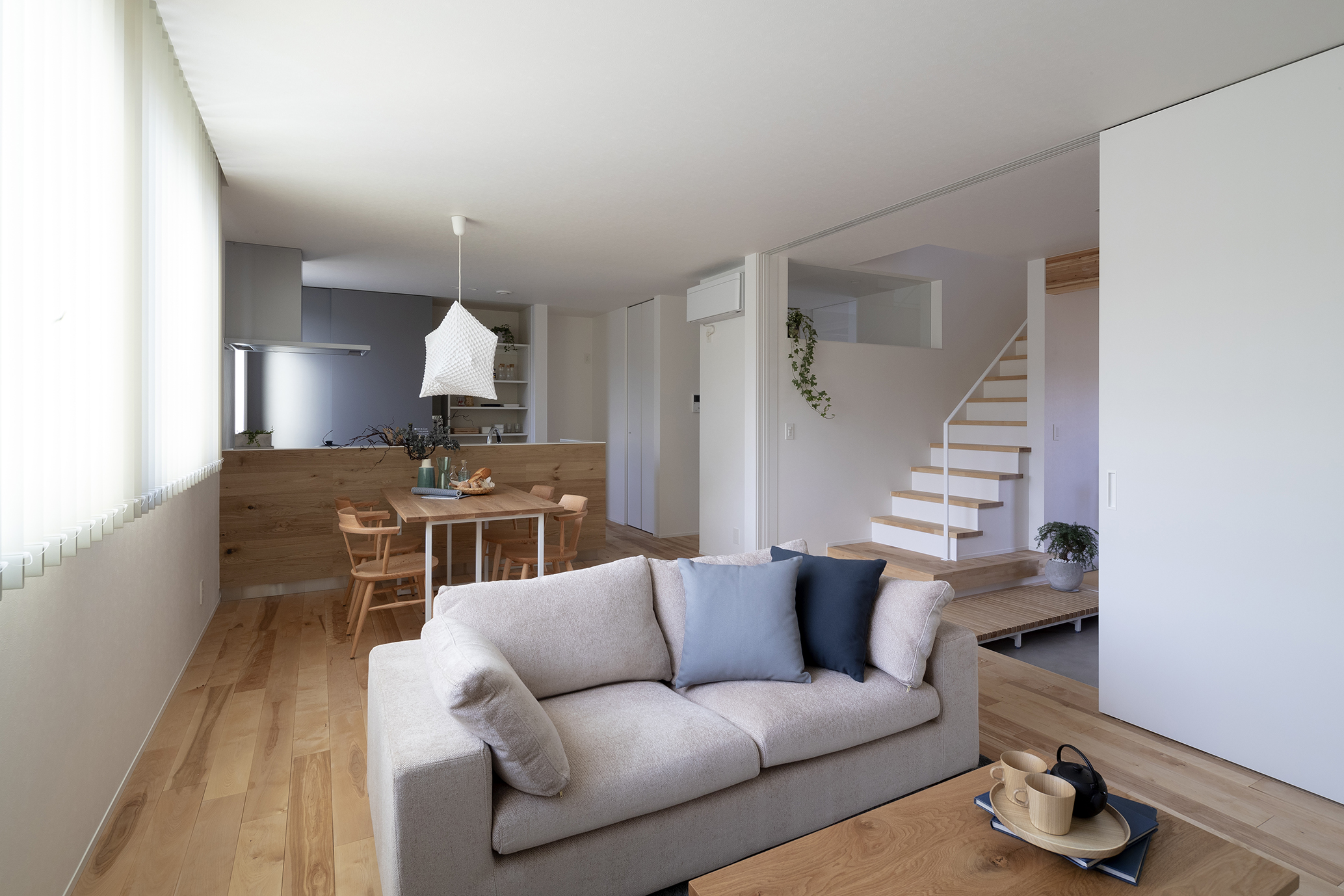 素材に寄り添う家