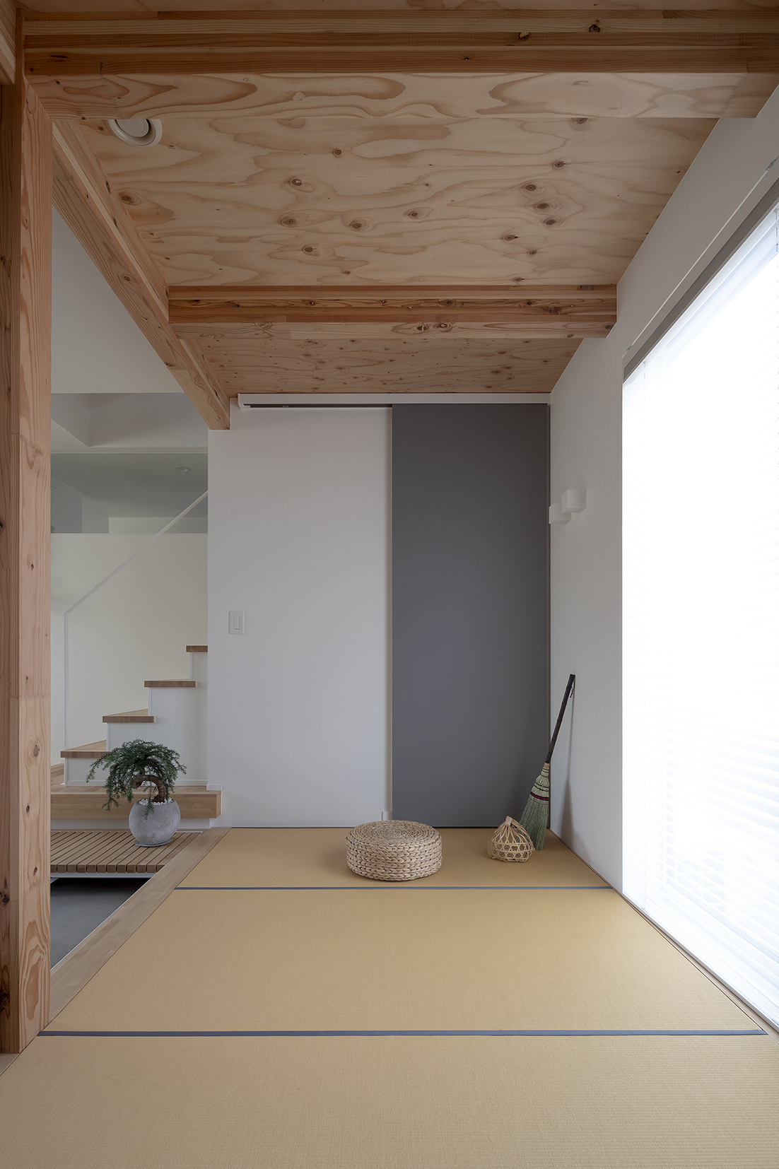 素材に寄り添う家